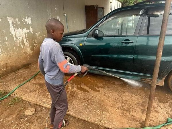 12-year-old Chilanga boy opts to wash cars to support single mother!