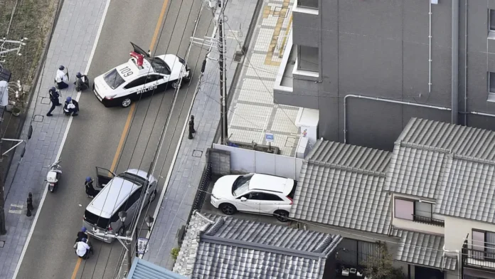 86-year-old accused shooter who locked himself in post office detained by Japanese police