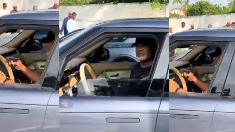 Popular Nigerian pastor brandishes a gun at content creator for filming his car