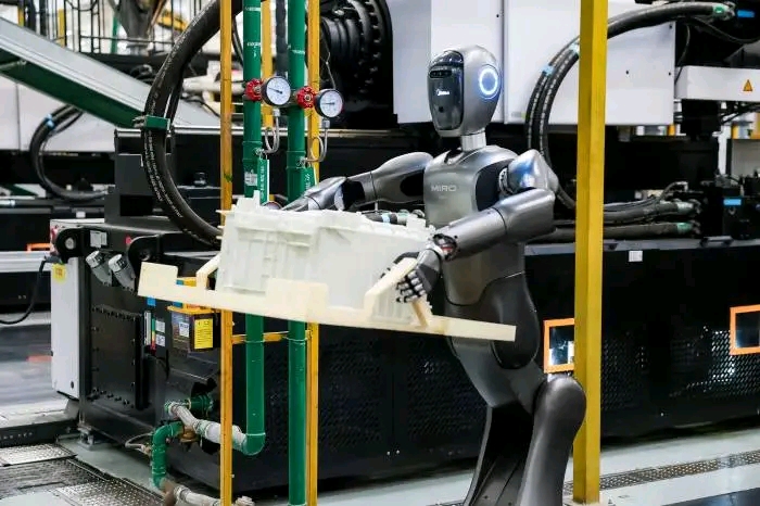 WHILE THE WEST PONDERS AI UTOPIA, CHINA’S IS BUSY MAKING WASHING MACHINES