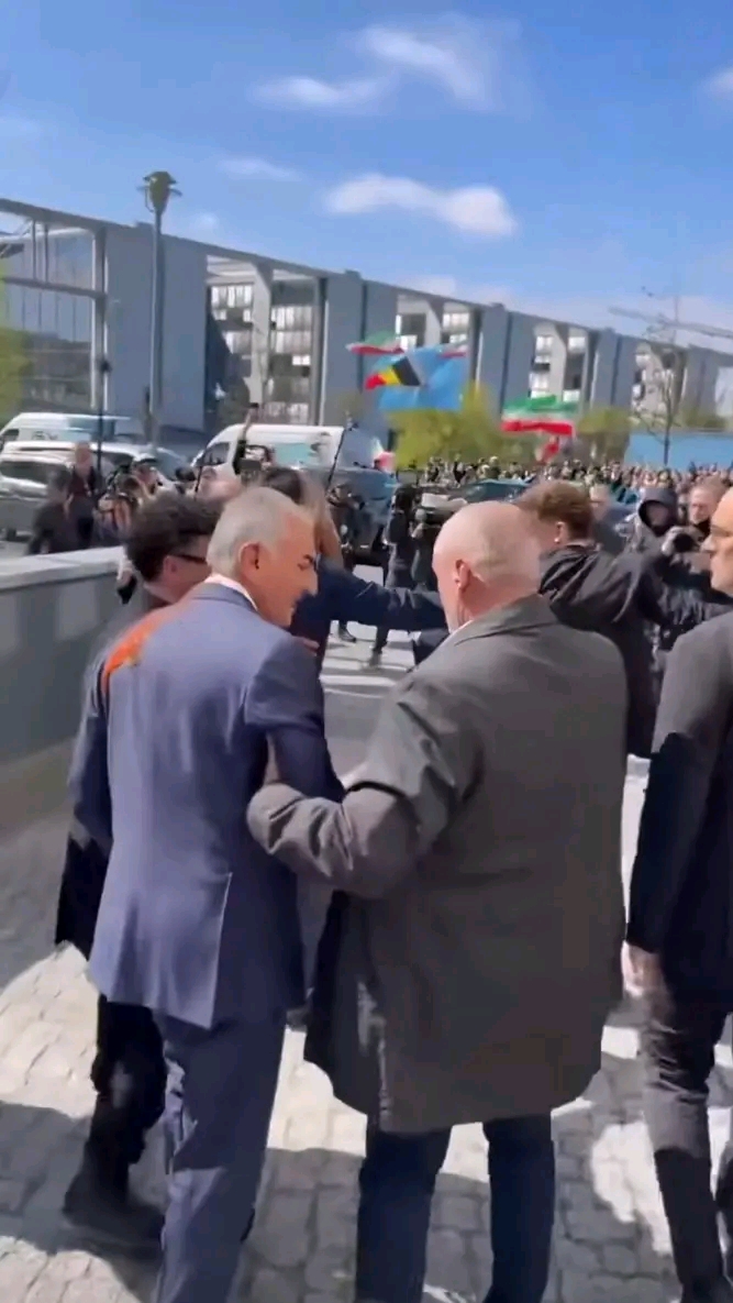 Exiled Iranian prince targeted with red liquid in Berlin incident