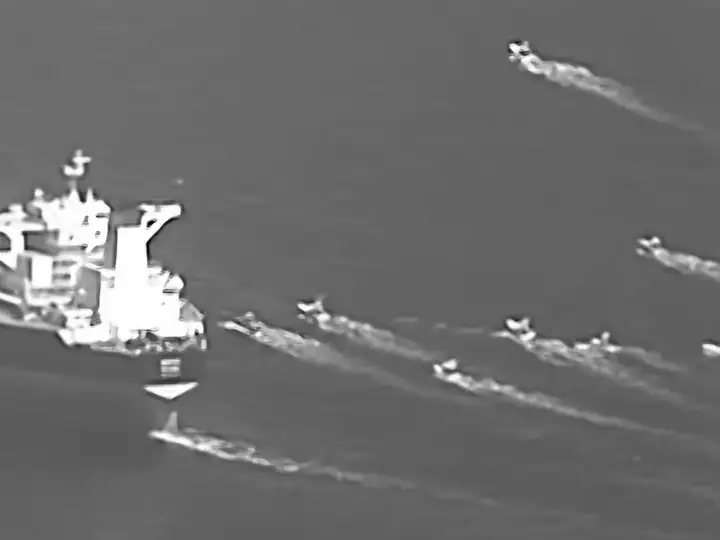 Images capture Iranian fast boats closely shadowing vessels in Strait of Hormuz
