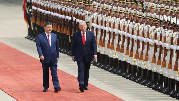 Donald Trump and Xi Jinping inspected an honor guard on the red carpet outside the Great Hall of the People during an official welcoming ceremony in Beijing
