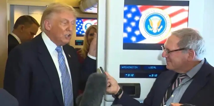 President Trump accuses reporter of TREASONOUS behavior on Air Force One