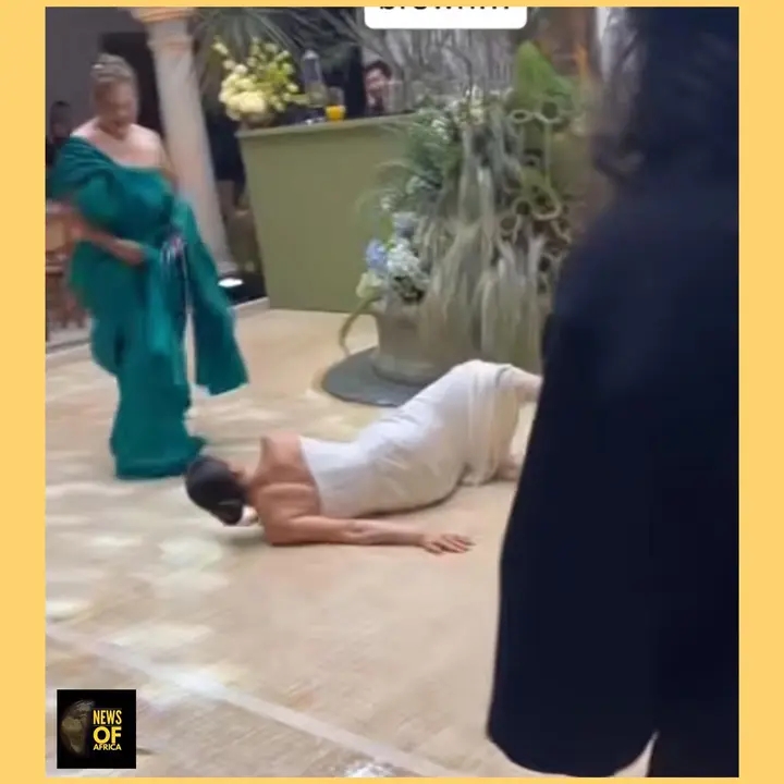 Bride falls at her wedding while dancing to Chris 