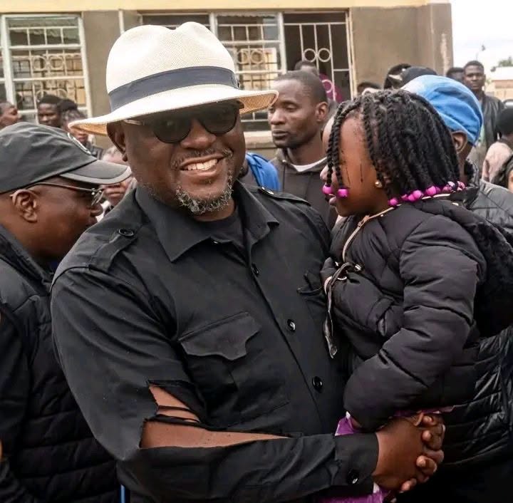 Gary Nkombo votes in torn shirt that became a symbol of defiance