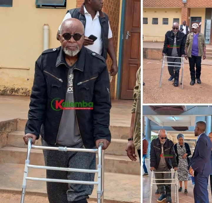 Vocal Katele Kalumba seals mouth as he appears in court