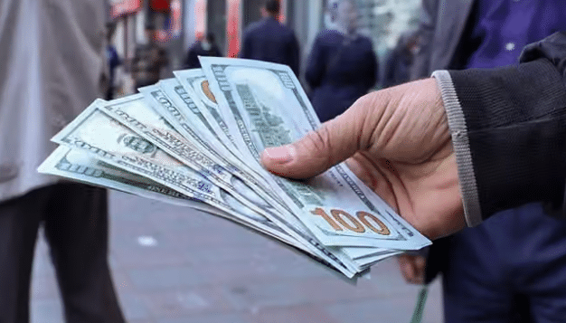 Iran’s currency slides past 2.7 million rials per dollar
